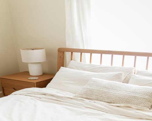 A peaceful tidy bedroom setting encouraging a night routine and deep sleep